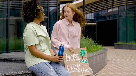 two friends talking after a protest