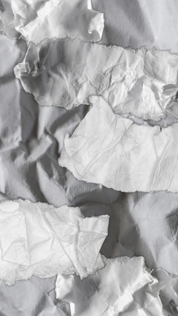 Crumpled and Torn White Paper Pieces Animation