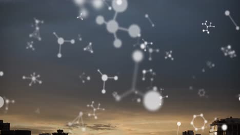 animation of molecules floating over cityscape