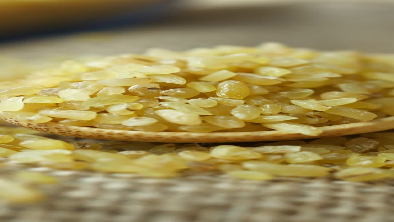 Bulgur in Wooden Spoon