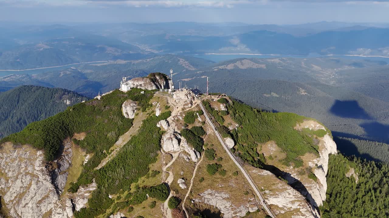 Aerial View of Mountain Peak with Telecommunication Towers