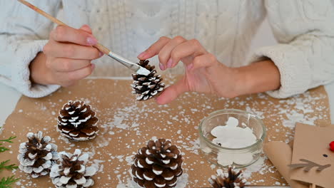 Child-Hands-Cut-Out-Paper-Trees-And-Ornaments