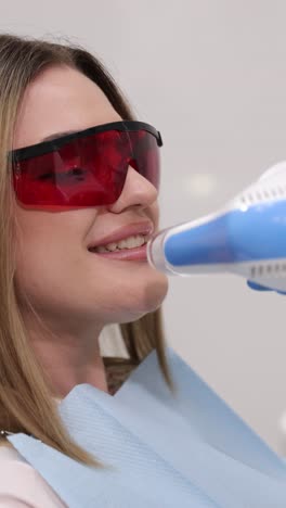 a patient had an advanced dental whitening procedure to enhance their smile and boost confidence and selfesteem. vertical video.
