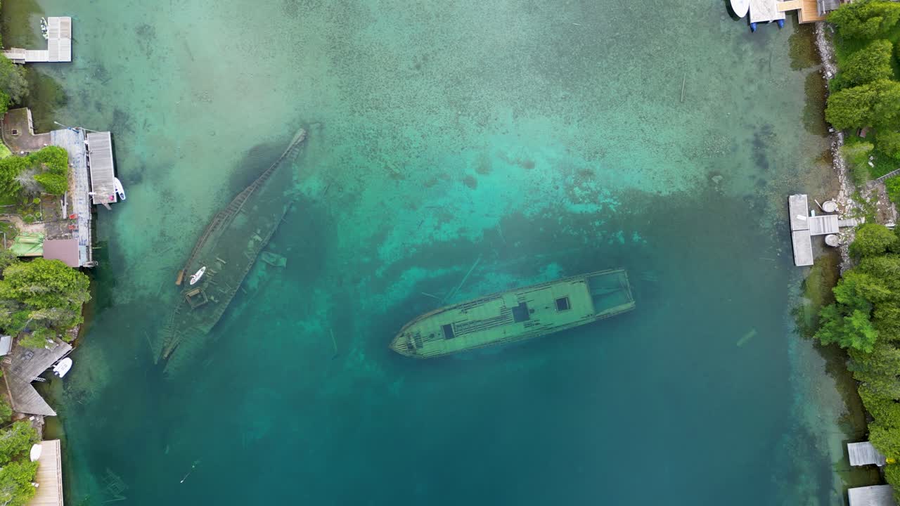Aerial View of Sunken Shipwrecks in Clear Turquoise Water