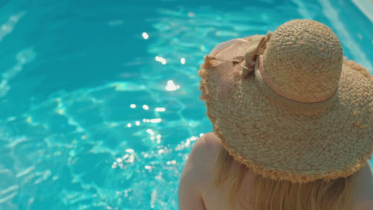 Woman Relaxing by Poolside
