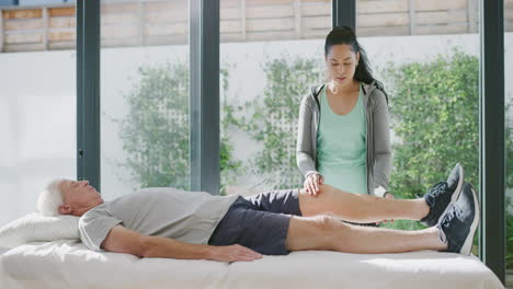 an attractive young physiotherapist examining