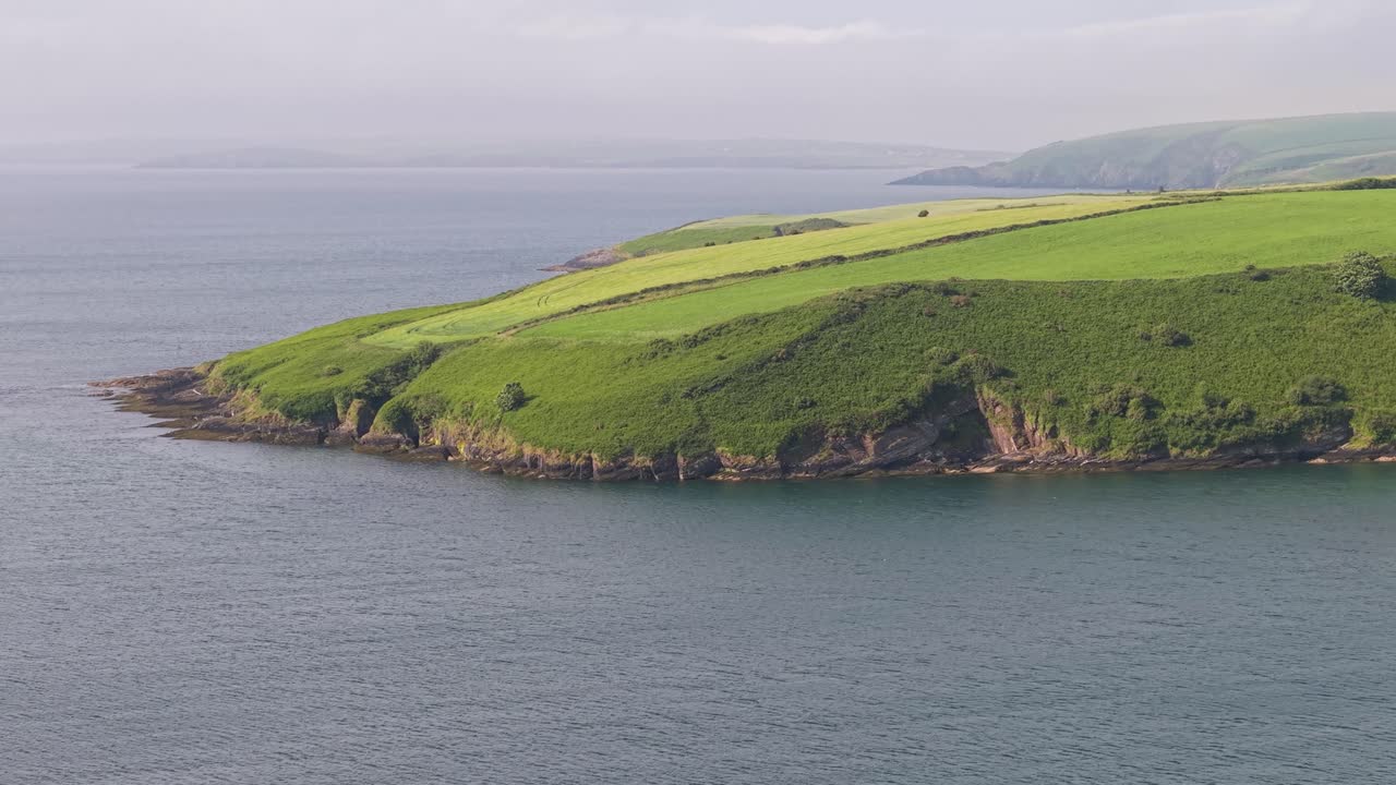 Lush green coast of Ireland near Cork city in tranquil mood