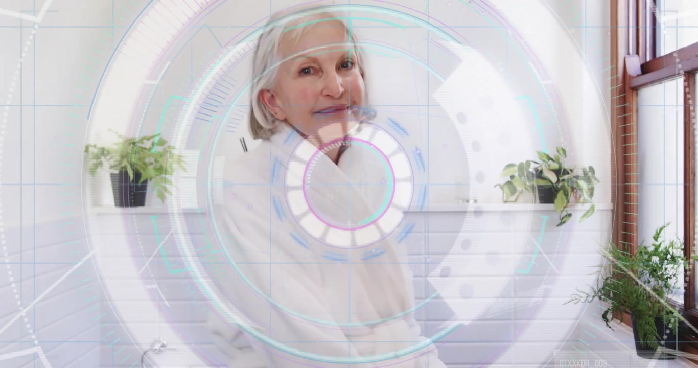 Senior woman performing shoulder and hip rotation in bathroom activating AR health overlay tracking