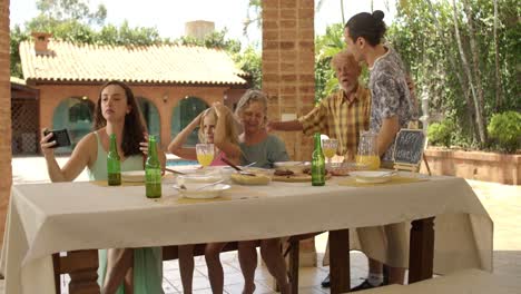 Family Celebrating Father's Day on a Sunny Patio