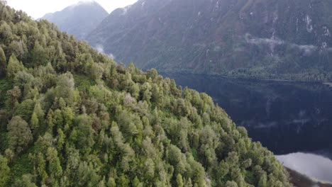 Panaromic-Aerial-Top-View-of-a-cloudy-dramatic-fjord-in-south-america,-Patagonia-Chile