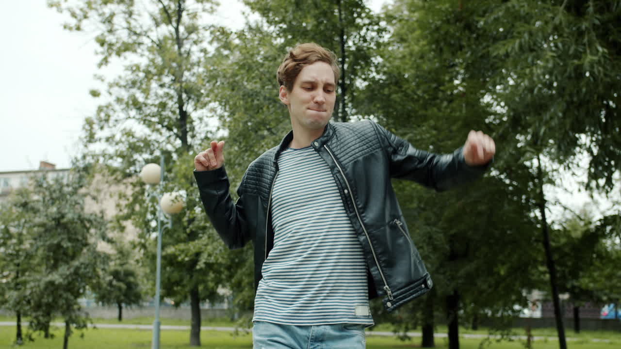 Man Dancing in a Park