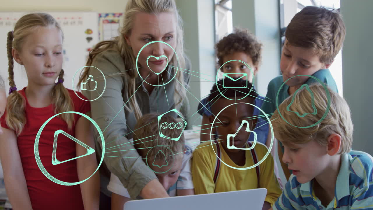 In school, teacher guiding children with animation of digital icons on screen