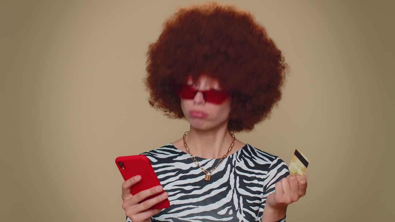 Happy woman use smartphone, plastic credit bank card, browsing say wow yes, found out great big win