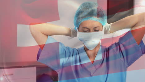 animation of flag of switzerland waving over surgeons in operating theatre