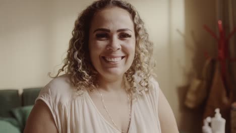 portrait of a happy smiling woman looking at camera