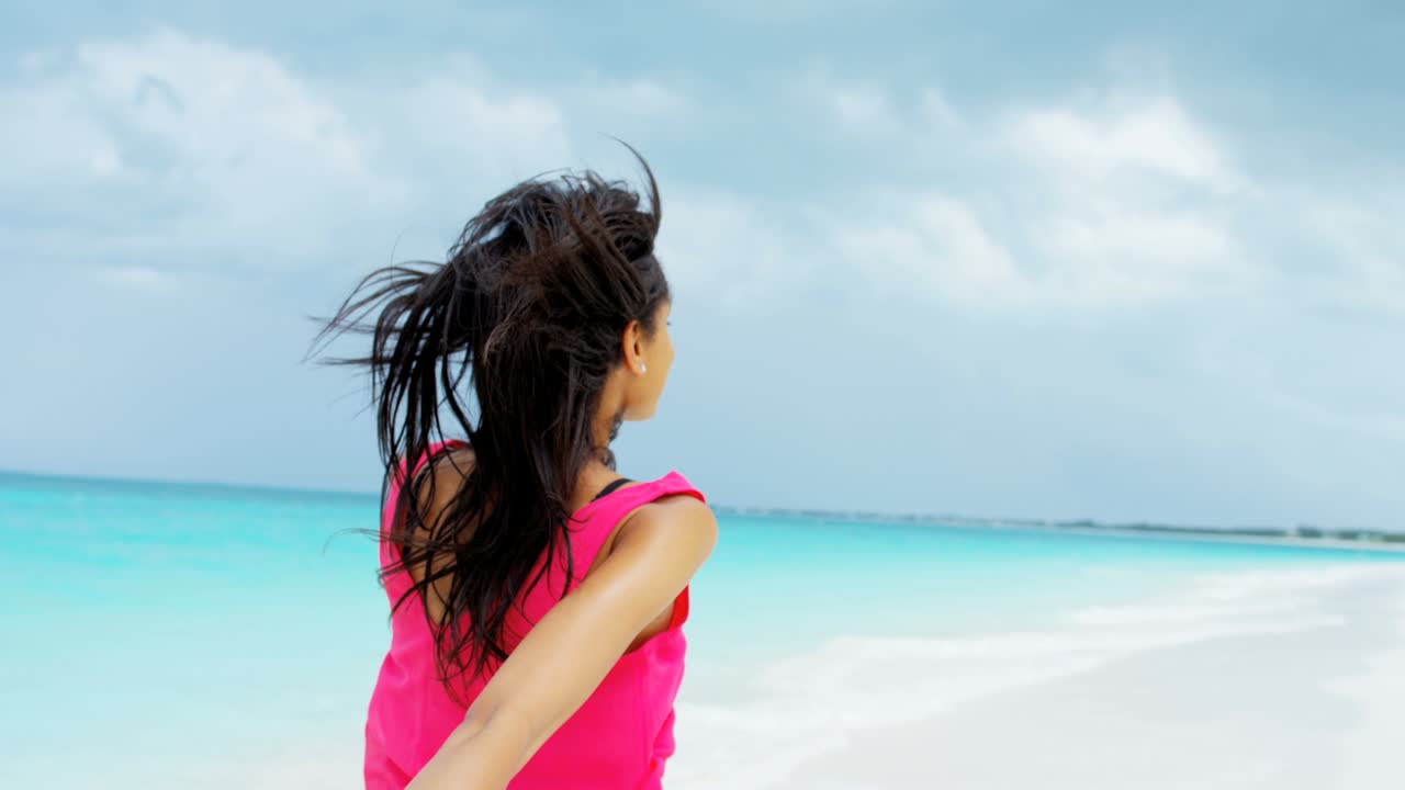 Portrait of luxury destination African American female walking