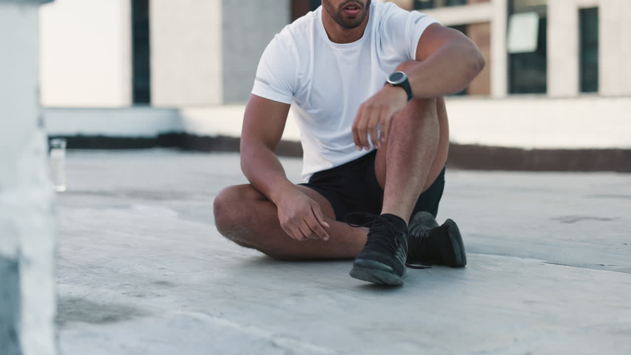 Fitness, man and shoes in sports preparation