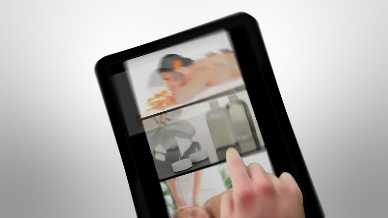Tablet computer showing spa scenes