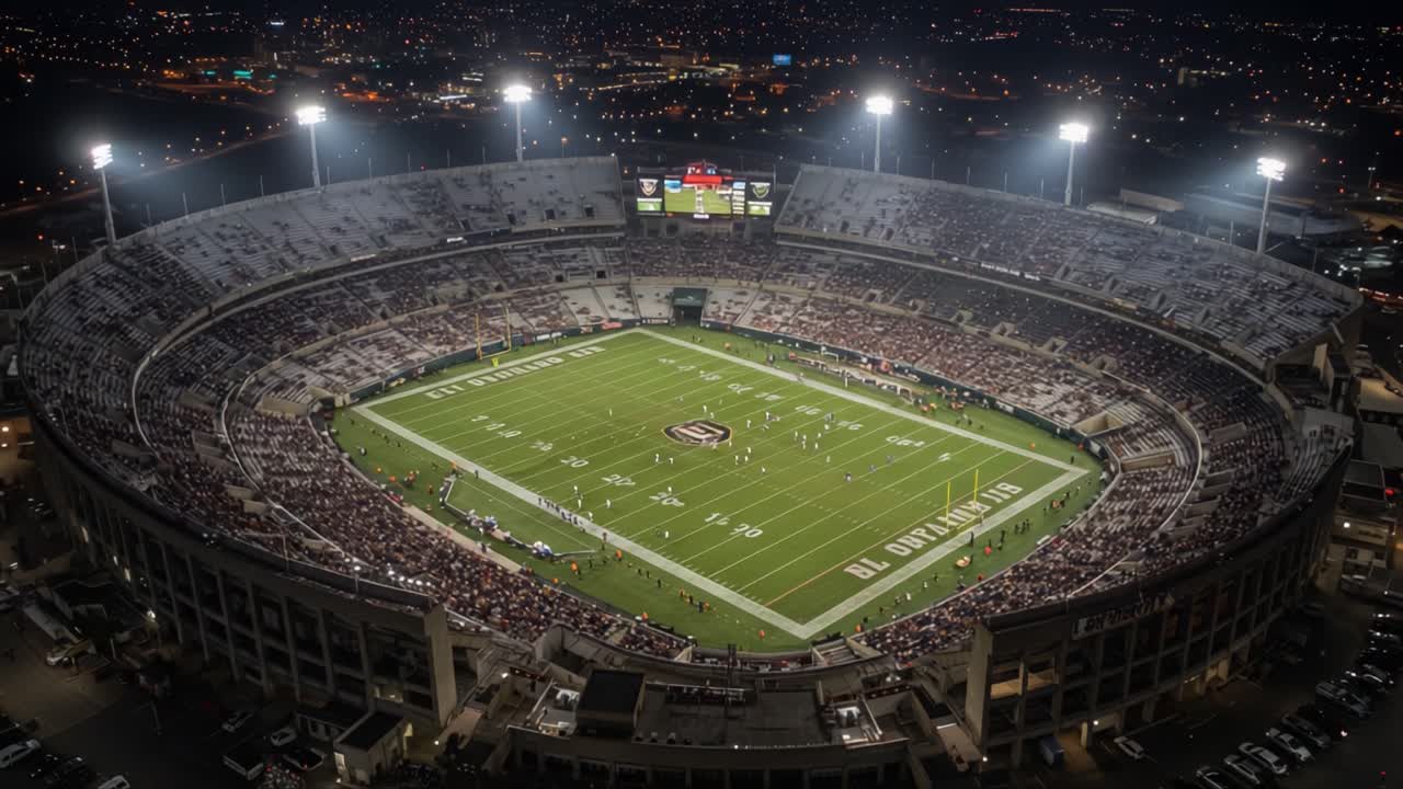 Aerial View of a Vibrant Nighttime Football Stadium Overflowing with Fans, Illuminated by Bright Lights and Set Against a Beautiful City Skyline