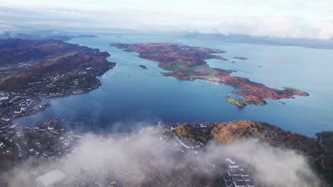 flying above clouds and orban town