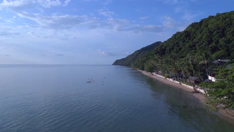 stunning aerial top view flight huts resort beach bungalows, jungle hilly island thailand 2022