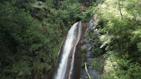 Scenic-Waterfall-And-Forest---Rexio-Waterfall-In-Folgoso-do-Courel,-Lugo,-Spain---Aerial-Drone-Shot