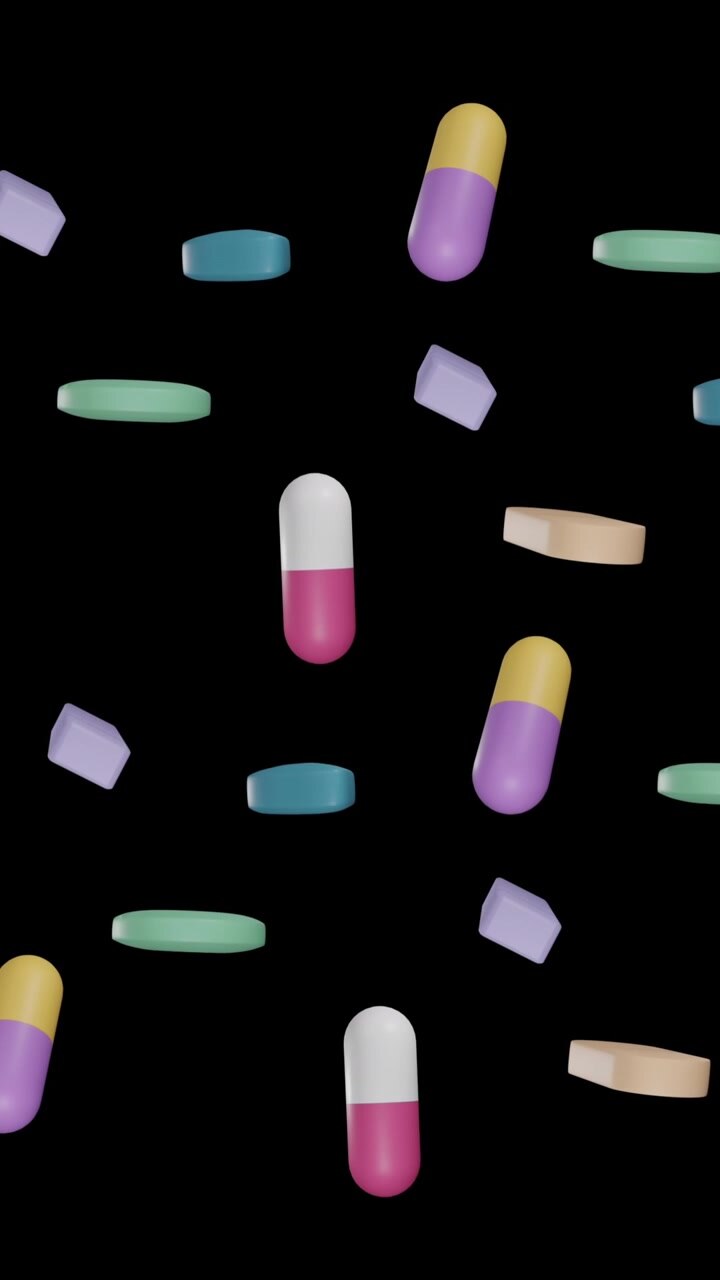 Animation of floating pills on black background