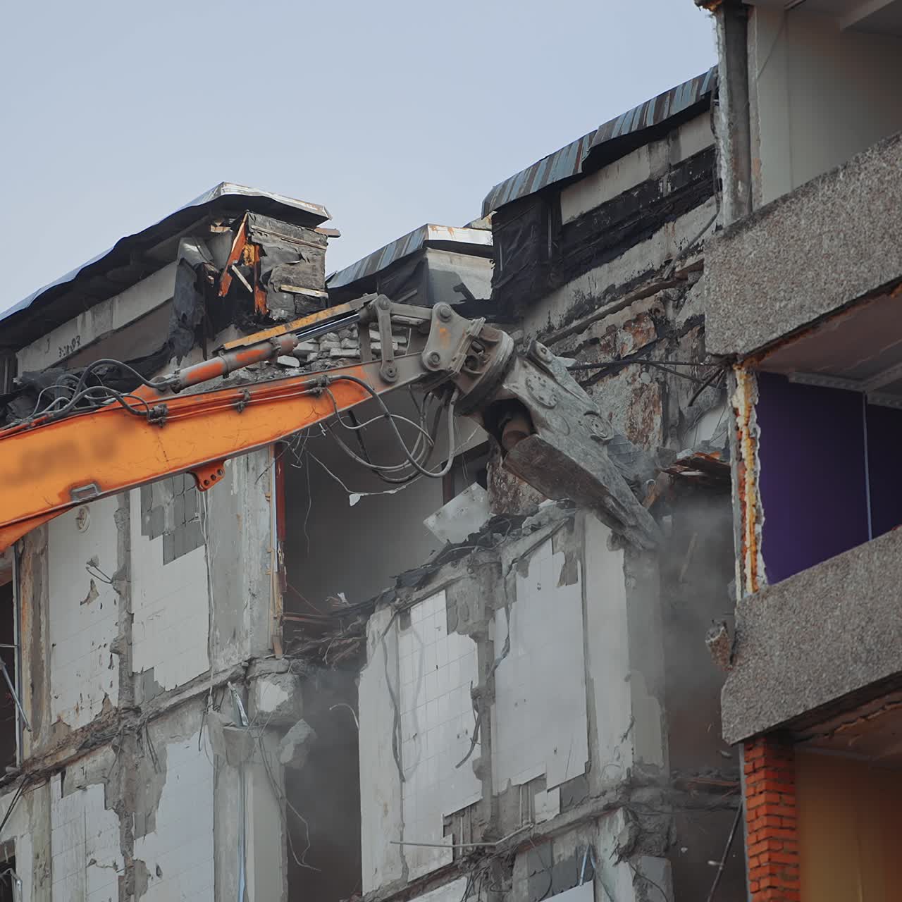 Demolition building after nature disease. Urban excavator destruction demolishing