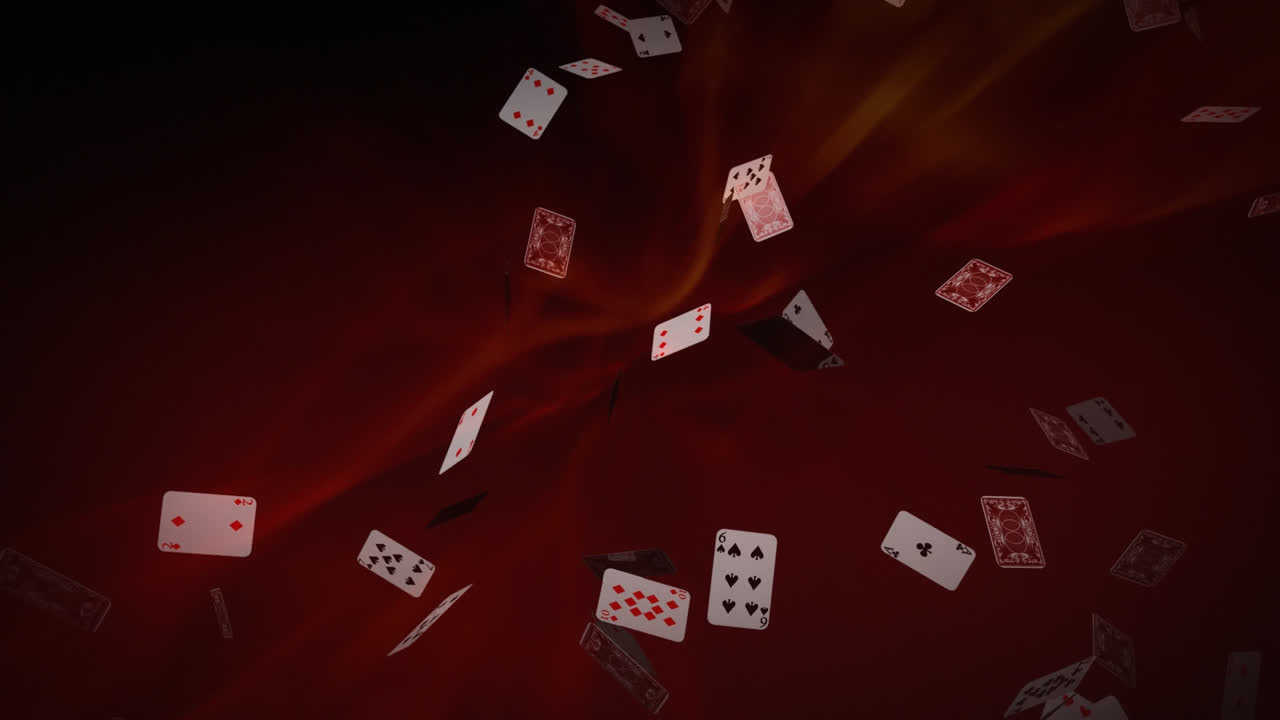 빨간 바탕에 카드가 떨어지고 있습니다.