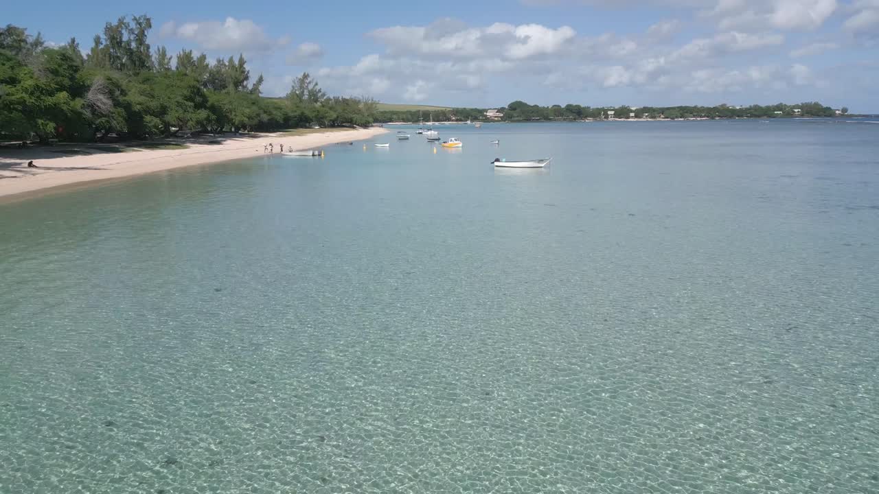 Mauritius - Albion - slow forward flying over the lagoon to the boats