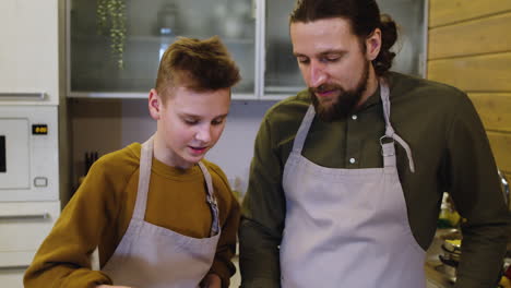 boy cooking meat