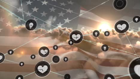 network of digital icons over waving us flag against clouds in the sky