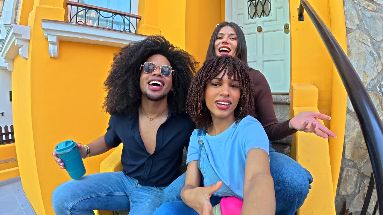 Friends Sitting on Yellow Steps