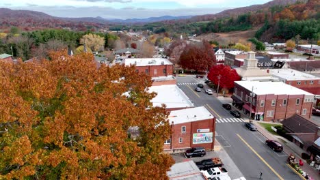 aerial-tilt-up-burnsville-nc,-north-carolina-in-fall-with-autumn-leaf-color