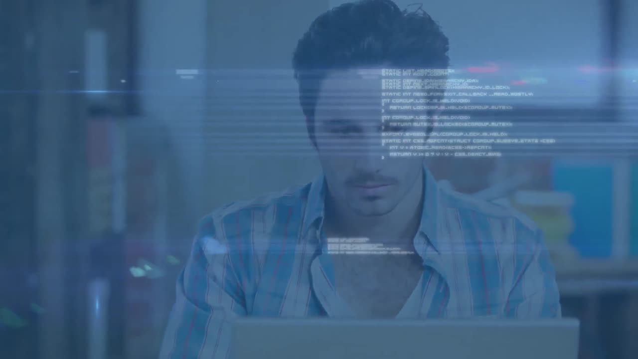 Animation of lens flares and programming language over caucasian man using laptop at office