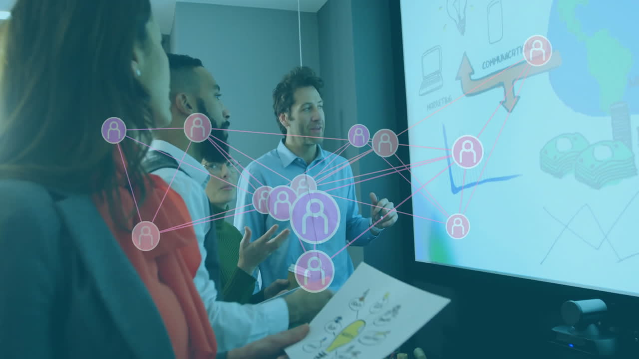 Discussing data visualization, diverse team in office with network ...