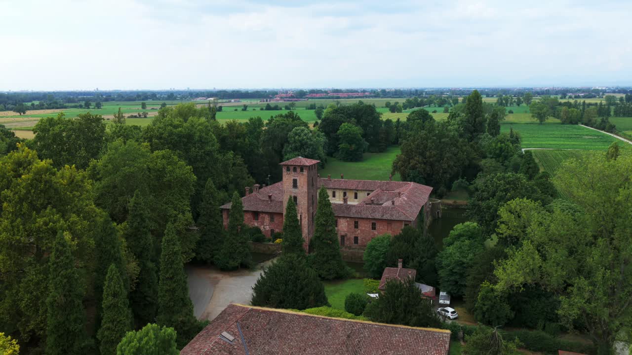 Aerial view of Borromeo Castle with moat and fields, Peschiera Borromeo, Italy