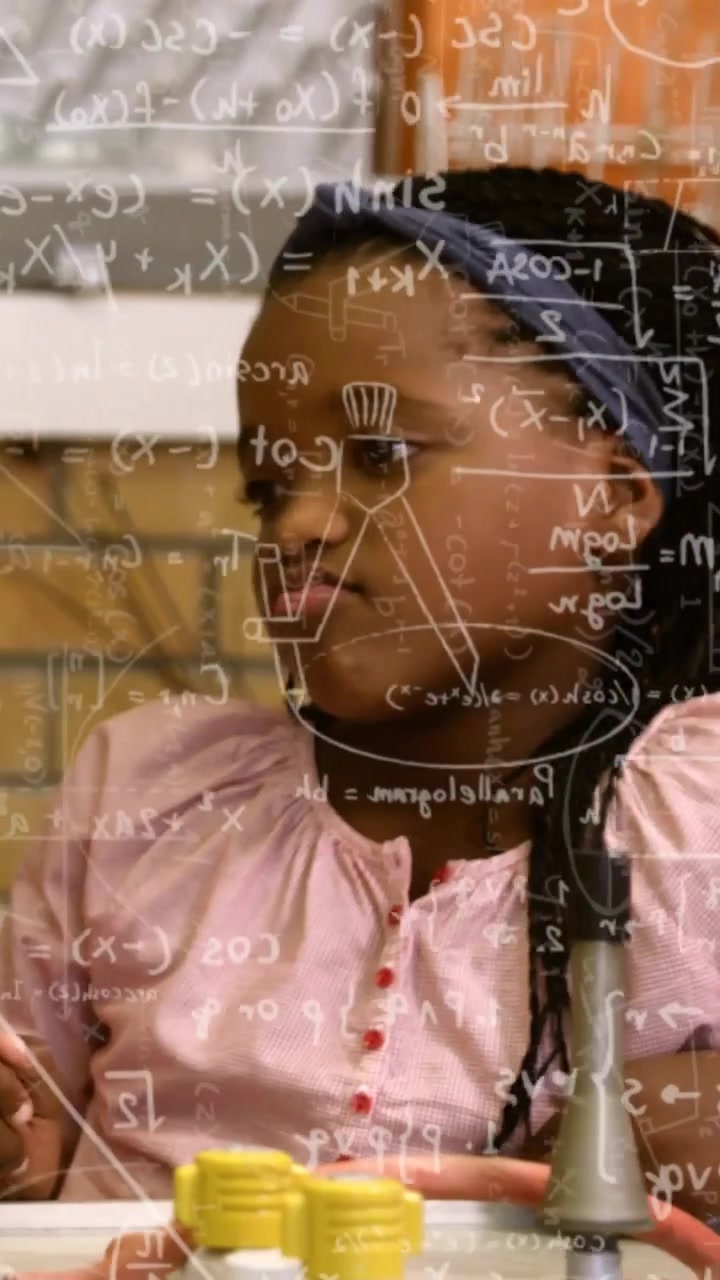 Vertical video: Teen girl reacting to peer look while testing fitting during class, math overlaying