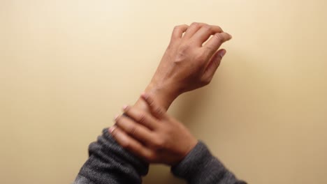 a person scratching their arm