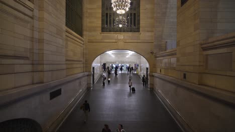 grand central terminal at night: people walking through the passageway