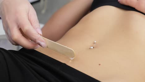 waxing the stomach area