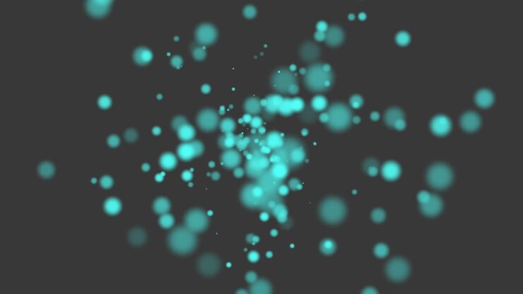 Green particles and round bokeh on shiny background