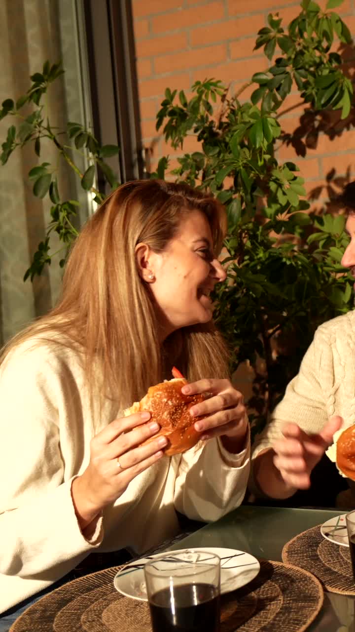 People eating burgers