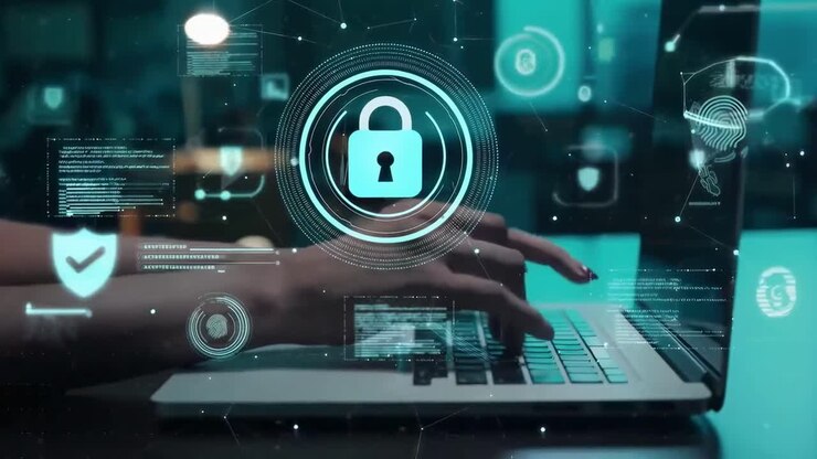 Person Typing on Laptop with Digital Cybersecurity Overlay