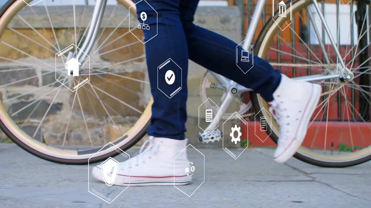 Woman entering right, walking past wheel to continue left while tech hex icons clustering near legs