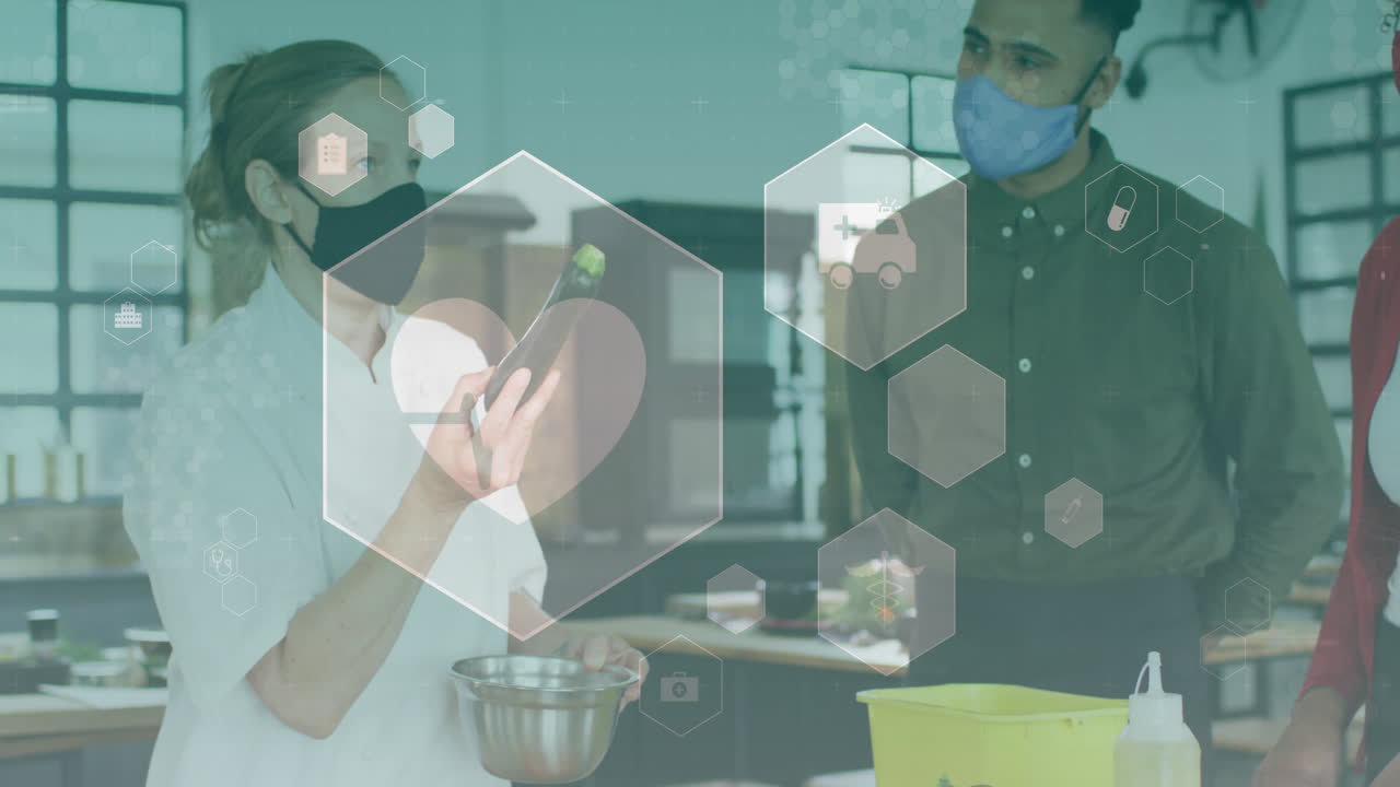 Female chef demonstrating cooking in professional kitchen, displaying floating health icons