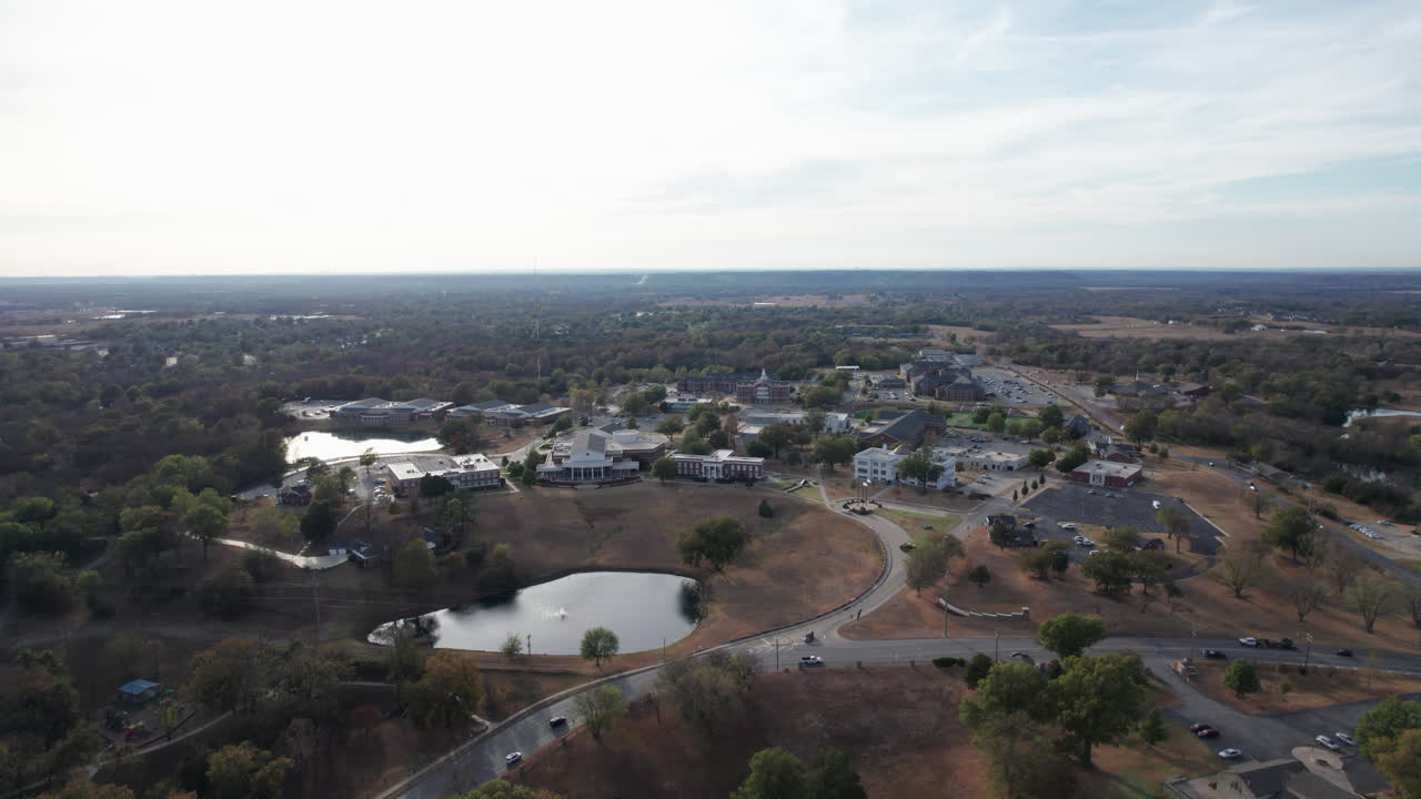 Wide shot pulls back on Claremore, Oklahoma and Rogers University