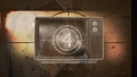 animación de una pantalla de televisión con cuenta atrás sobre diversas personas