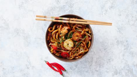 traditional asian udon stir fry noodles with shrimp