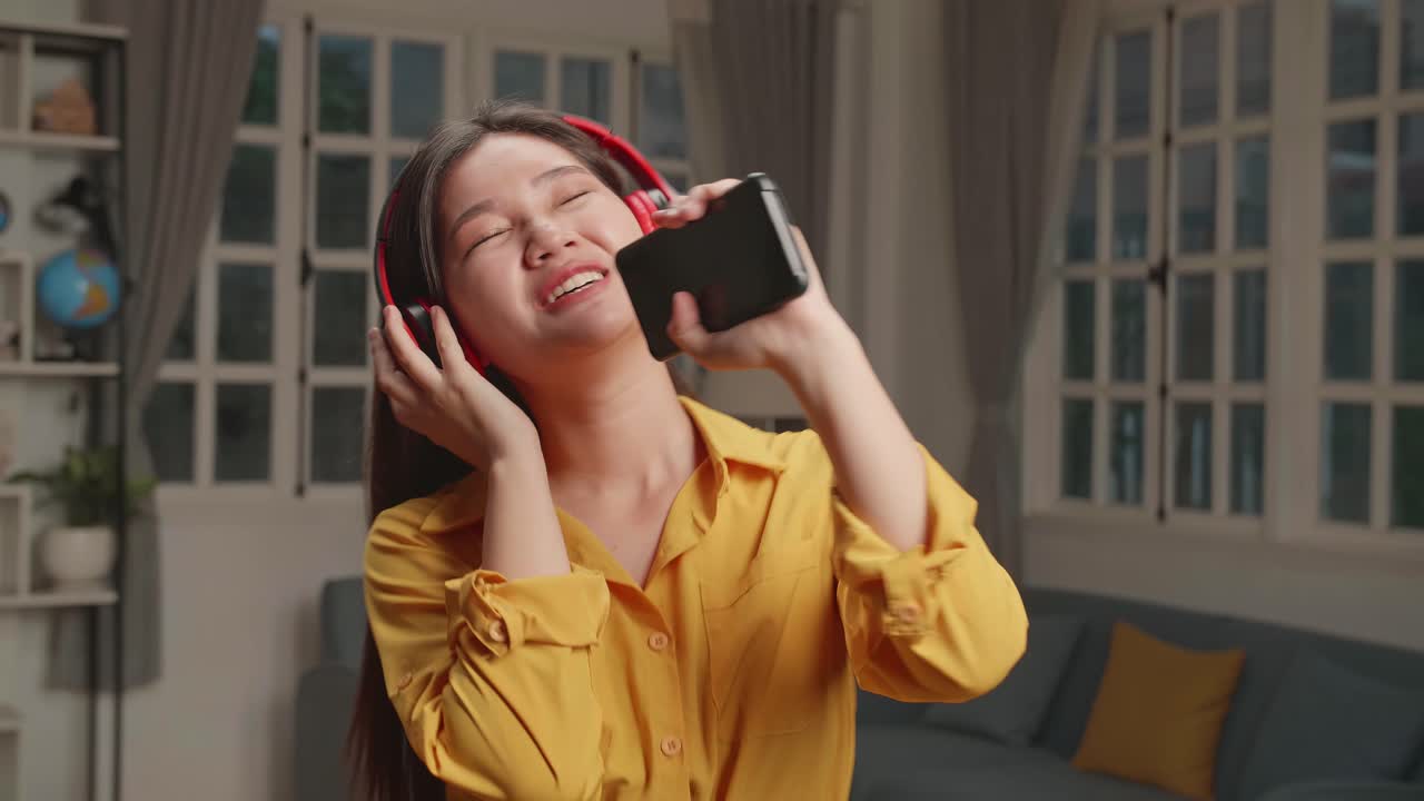 Woman Singing Karaoke at Home